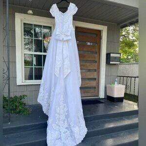White Lace Formal Wedding Dress With Train and Gorgeous Bow Detail